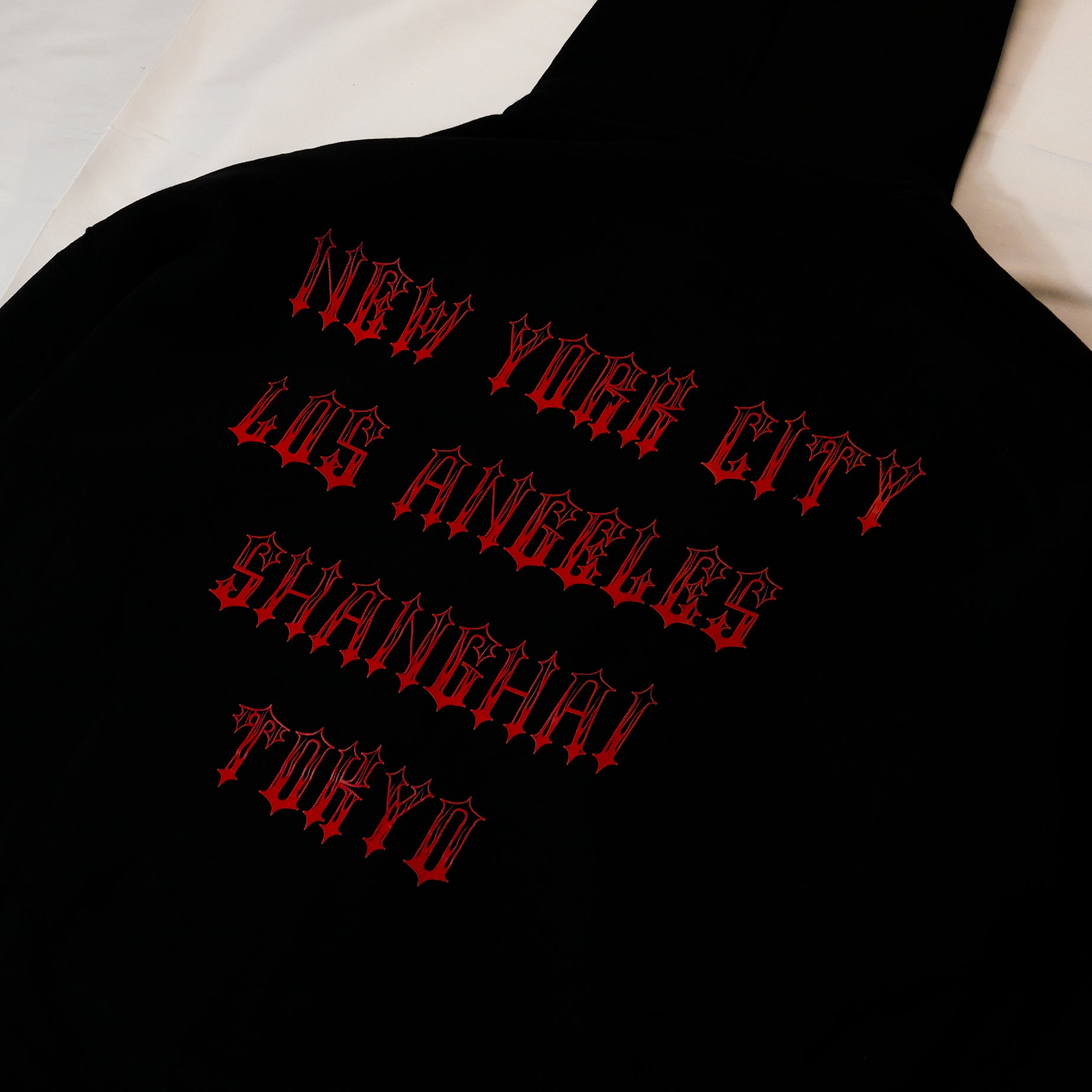 CITY SERIES BLACK AND RED FLAME LOGO ZIP UP SWEATER